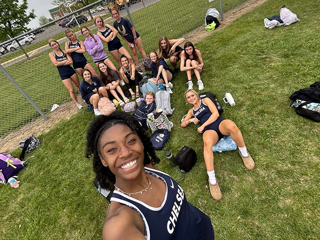 Educatius track selfie on field