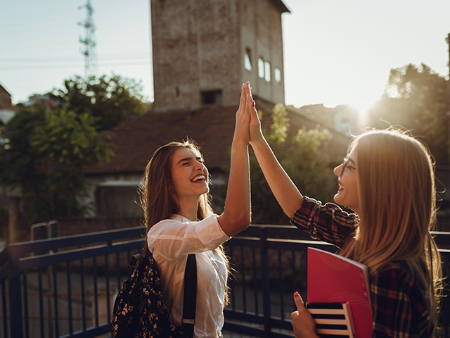 High school girls high five