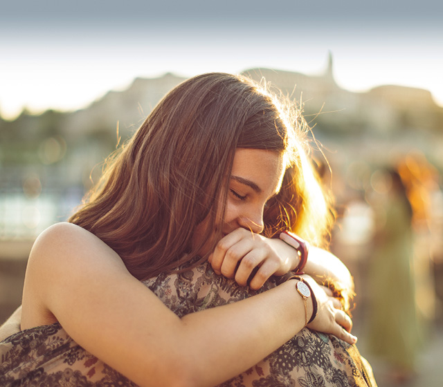 Student girls hugging