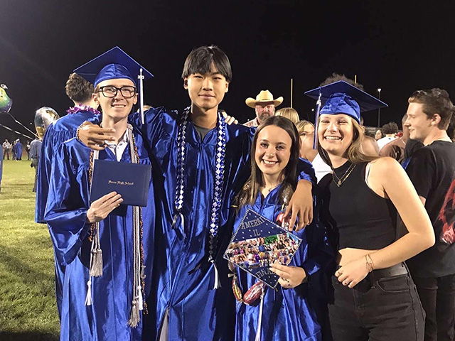 graduation cap and gown with diversity