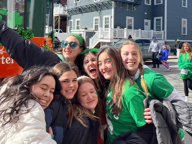 happy group of girl friends st patrick's day